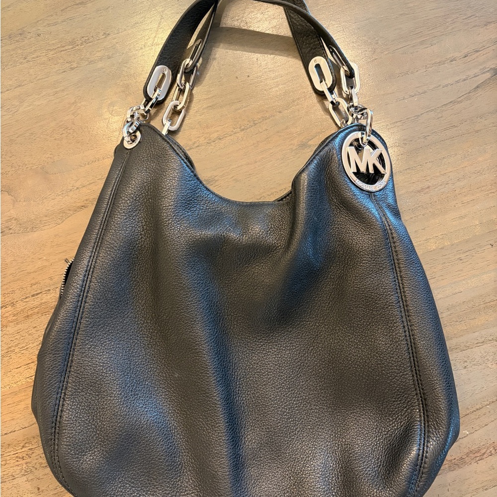 Michael Kors Black Hobo Bag with Silver Accents